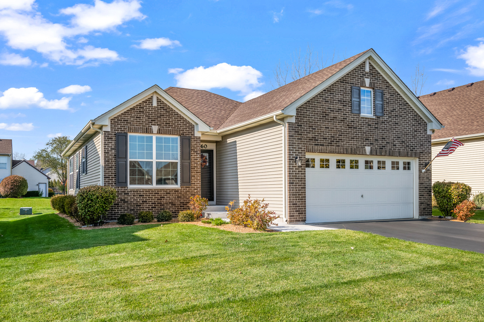 460 Mahogany Drive Algonquin, IL 60102 - Photo 1 of 29 a front view of a house with garden