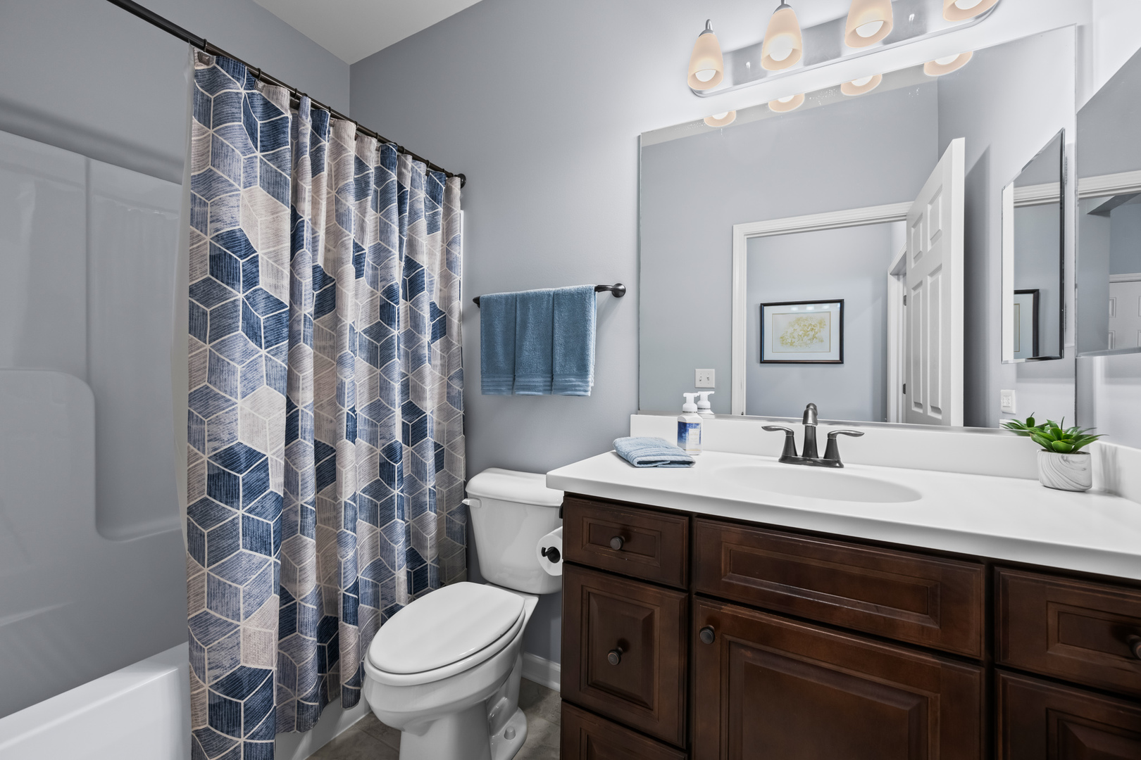 460 Mahogany Drive Algonquin, IL 60102 - Photo 16 of 29 a bathroom with a double vanity sink toilet and a mirror