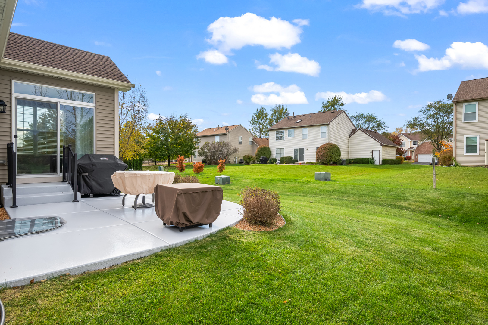 460 Mahogany Drive Algonquin, IL 60102 - Photo 22 of 29 a view of a house with a yard and sitting area