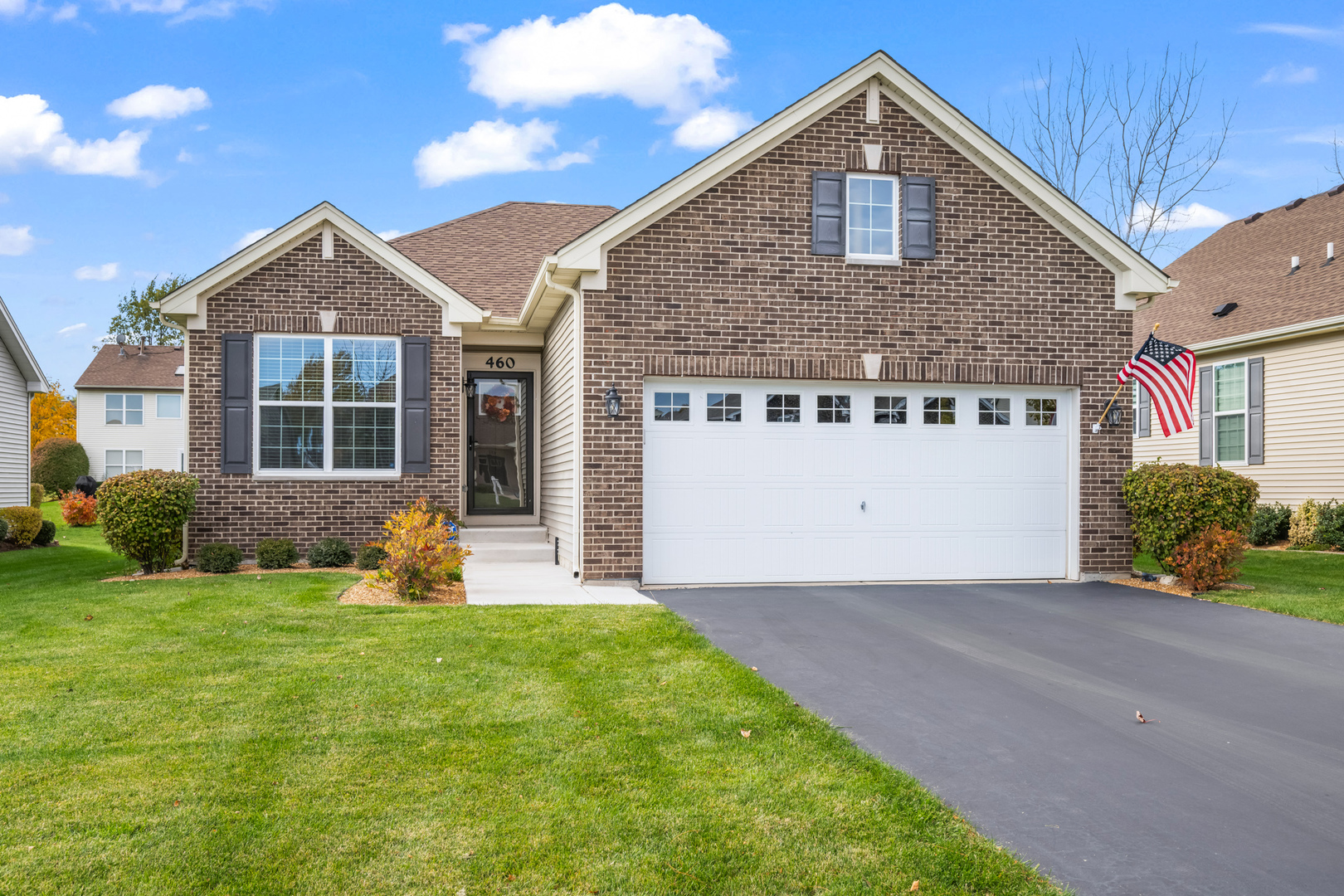 460 Mahogany Drive Algonquin, IL 60102 - Photo 23 of 29 a front view of a house with a yard and garage
