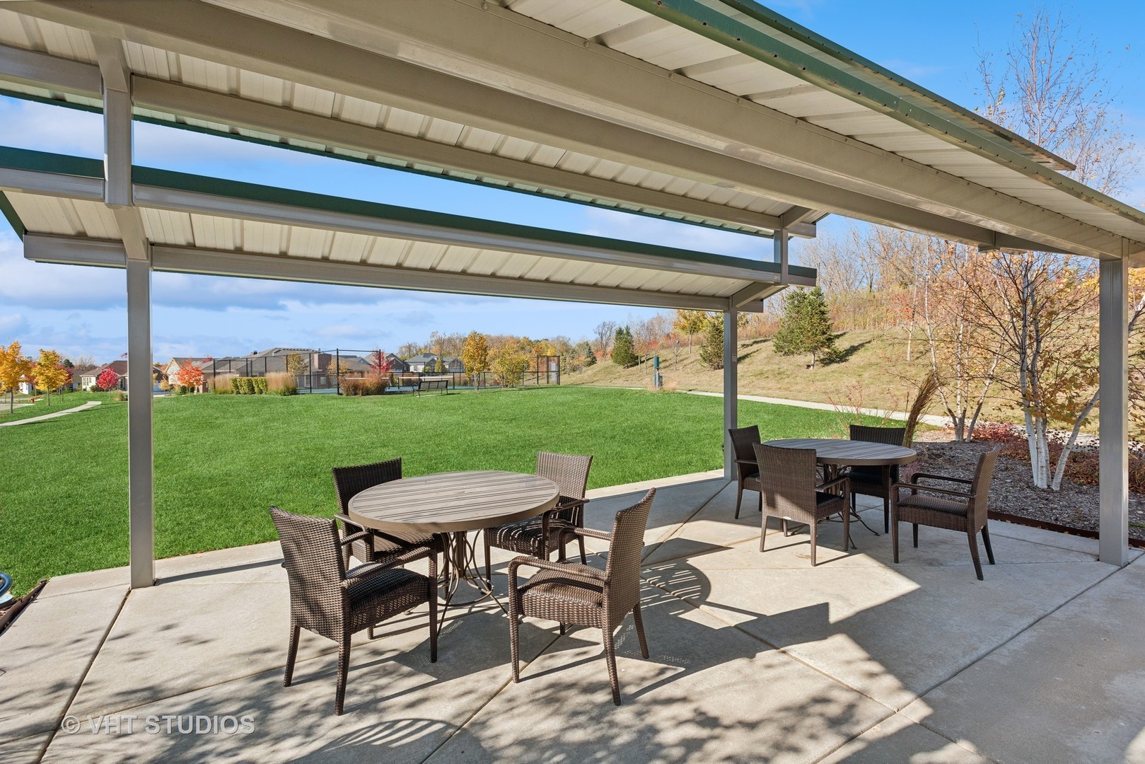460 Mahogany Drive Algonquin, IL 60102 - Photo 26 of 29 a view of a patio with a table chairs and a backyard