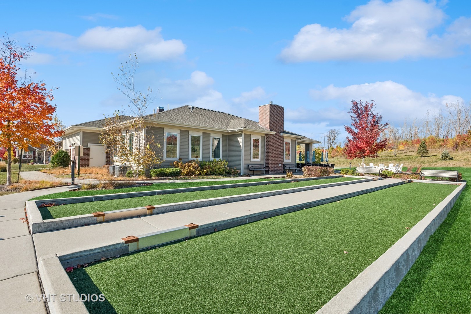 460 Mahogany Drive Algonquin, IL 60102 - Photo 28 of 29 a front view of a house with a garden and trees