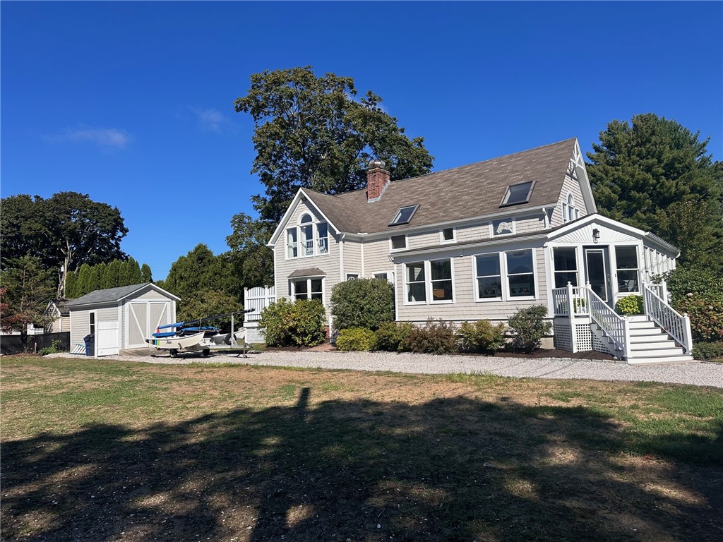 41 8th Avenue Warwick, RI 02886 - Photo 2 of 49 side faces south (toward Greenwich Bay