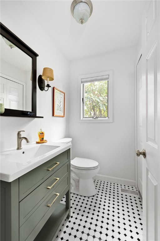 41 8th Avenue Warwick, RI 02886 - Photo 24 of 49 half bathroom with laundry appliances in closet