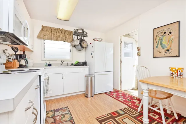 a bedroom with a bed and a cabinets