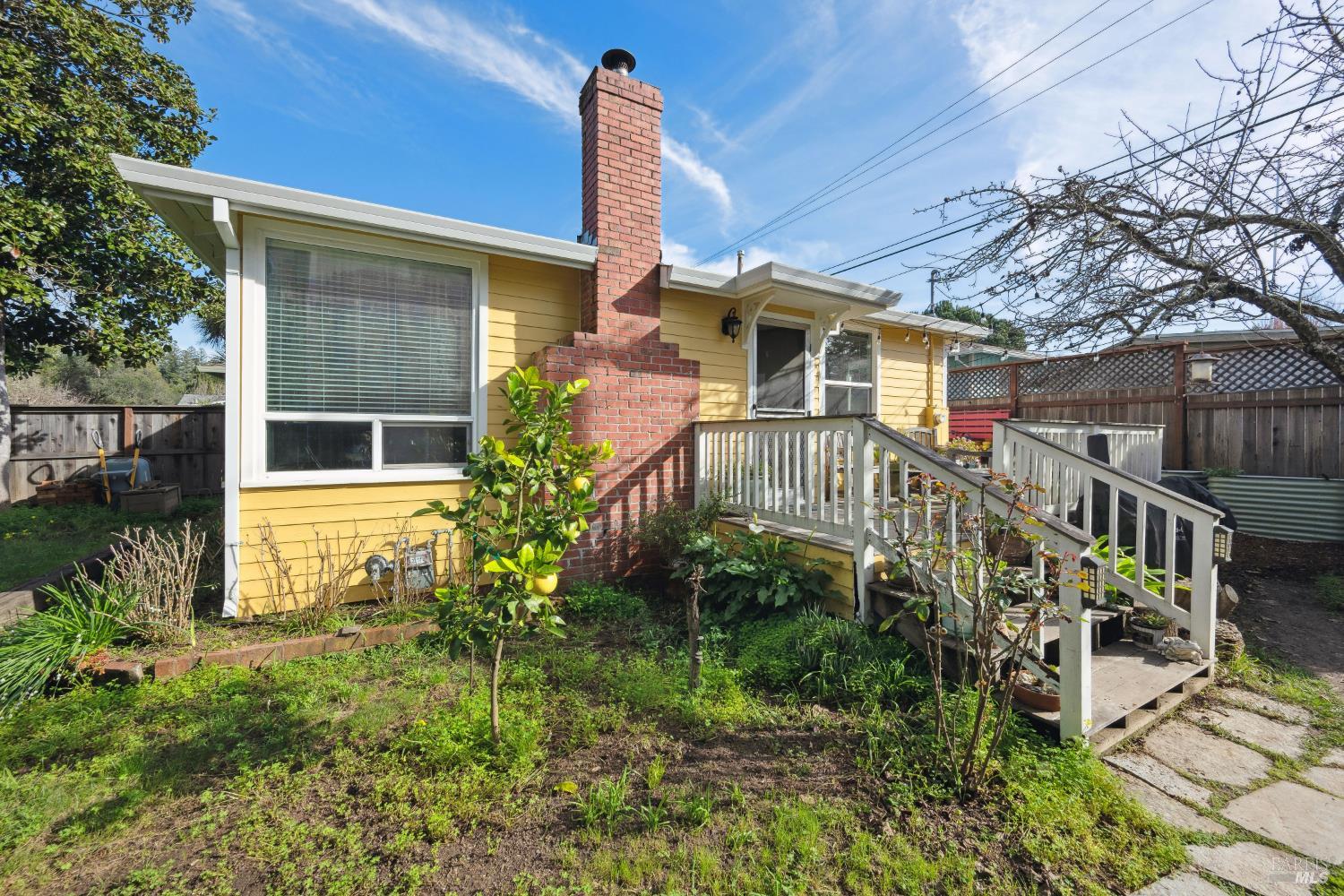 8423 Spring Drive Forestville, CA 95436 - Photo 1 of 1 a front view of house with yard and green space