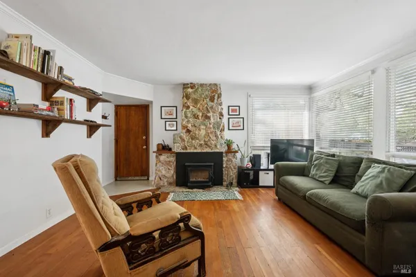 a kitchen with a sink cabinets and window