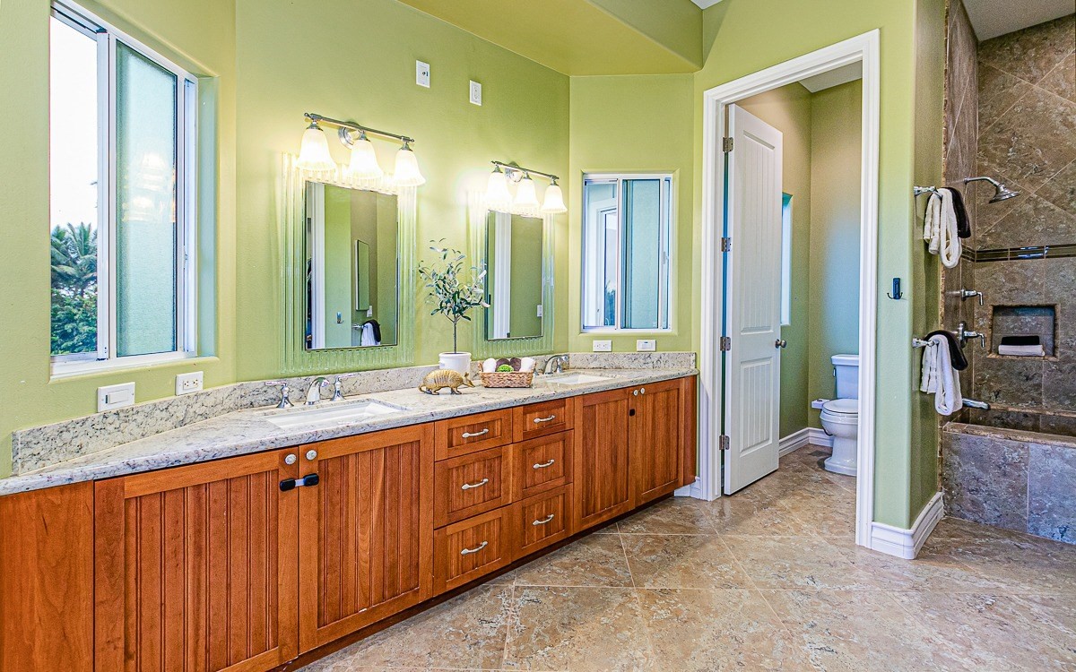 28-256 Akaka Falls Road Honomu, HI 96728 - Photo 18 of 26 a bathroom with a double vanity sink and a large mirror