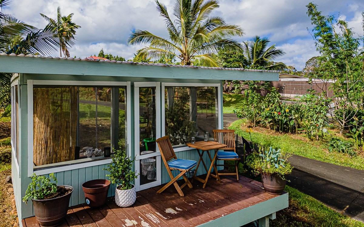 28-256 Akaka Falls Road Honomu, HI 96728 - Photo 9 of 26 a house view with a seating space and garden view