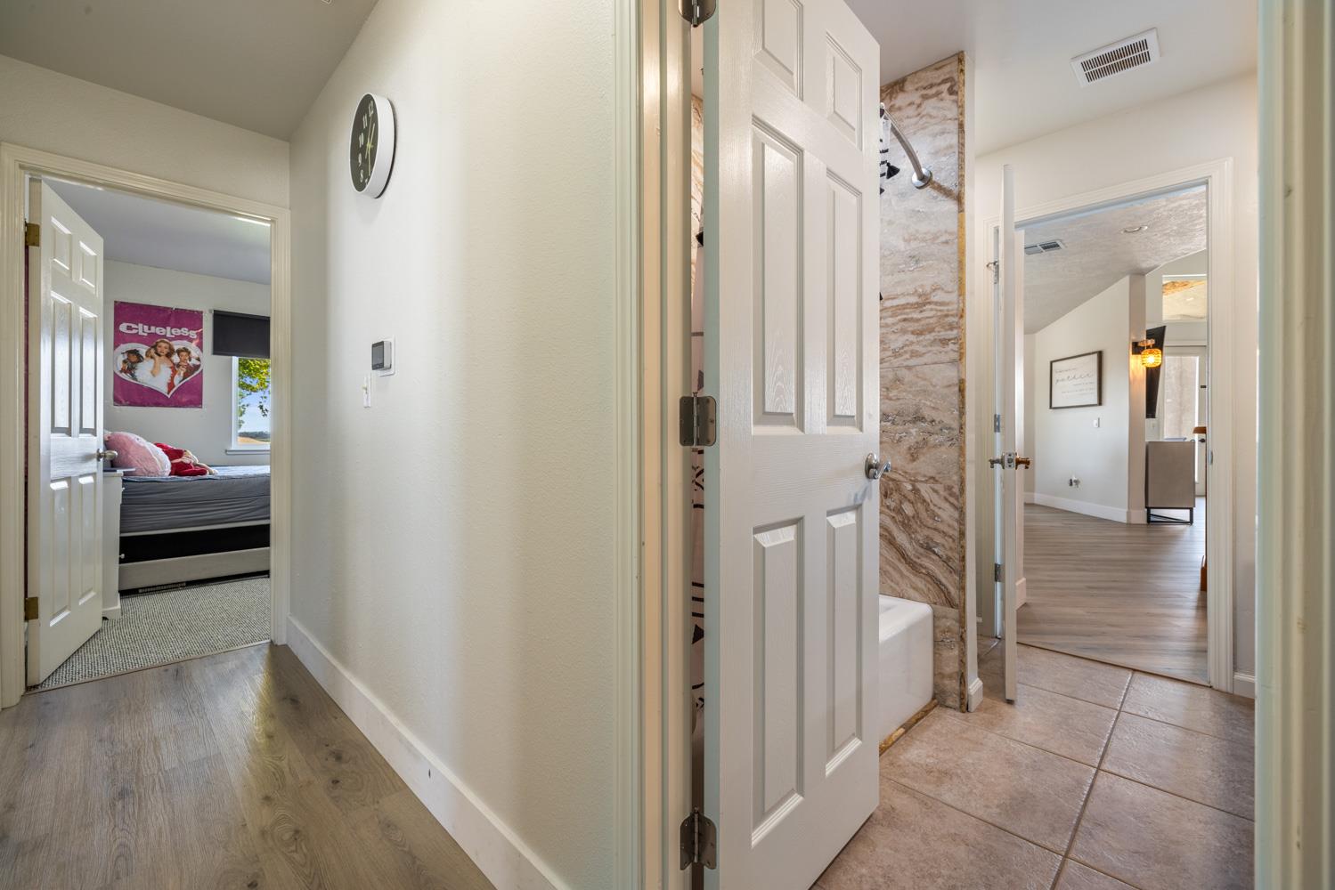 8300 Jantzen Road Modesto, CA 95357 - Photo 38 of 73 a view of a hallway view with wooden floor and staircase