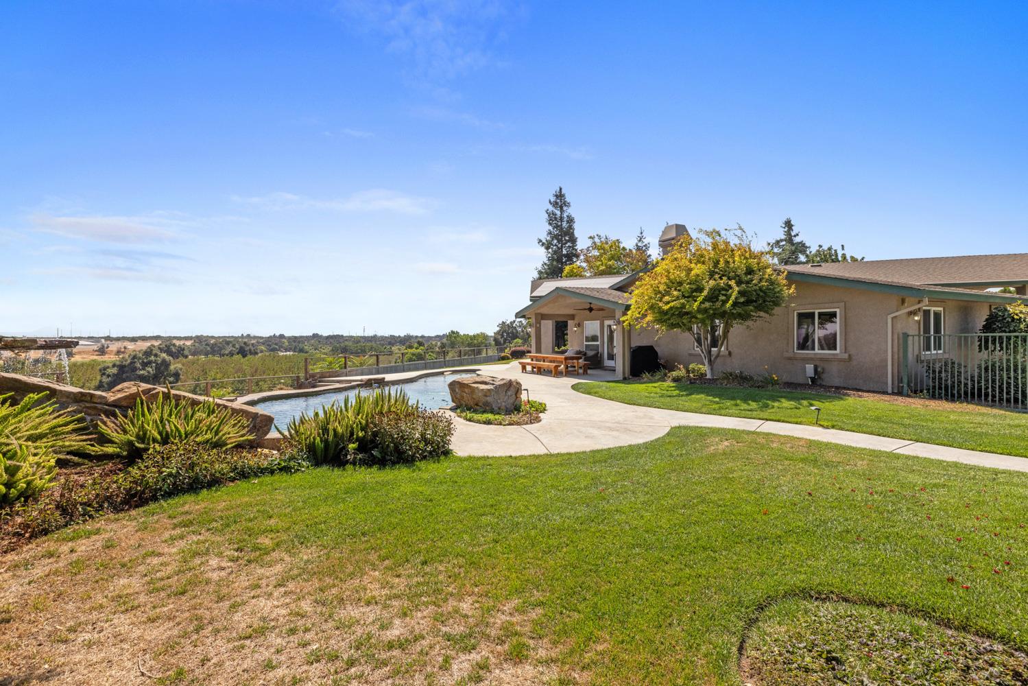 8300 Jantzen Road Modesto, CA 95357 - Photo 57 of 73 a view of a house with a yard