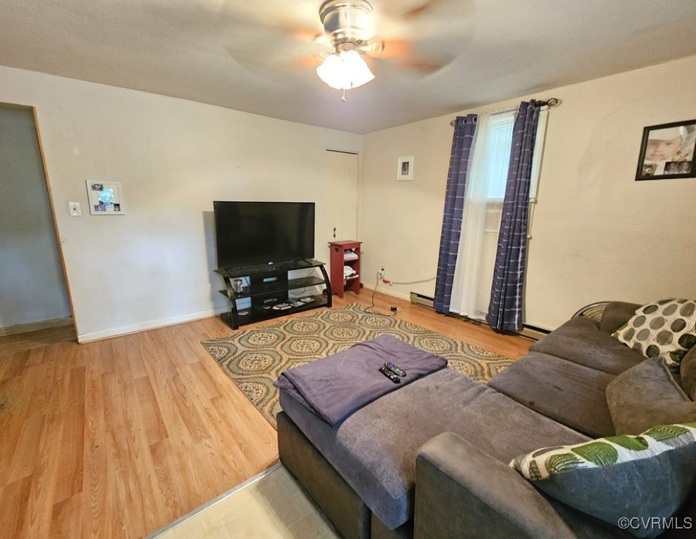 2626 Troublesome Creek Road Dillwyn, VA 23936 - Photo 18 of 24 a bedroom with a bed and a flat tv screen on dresser