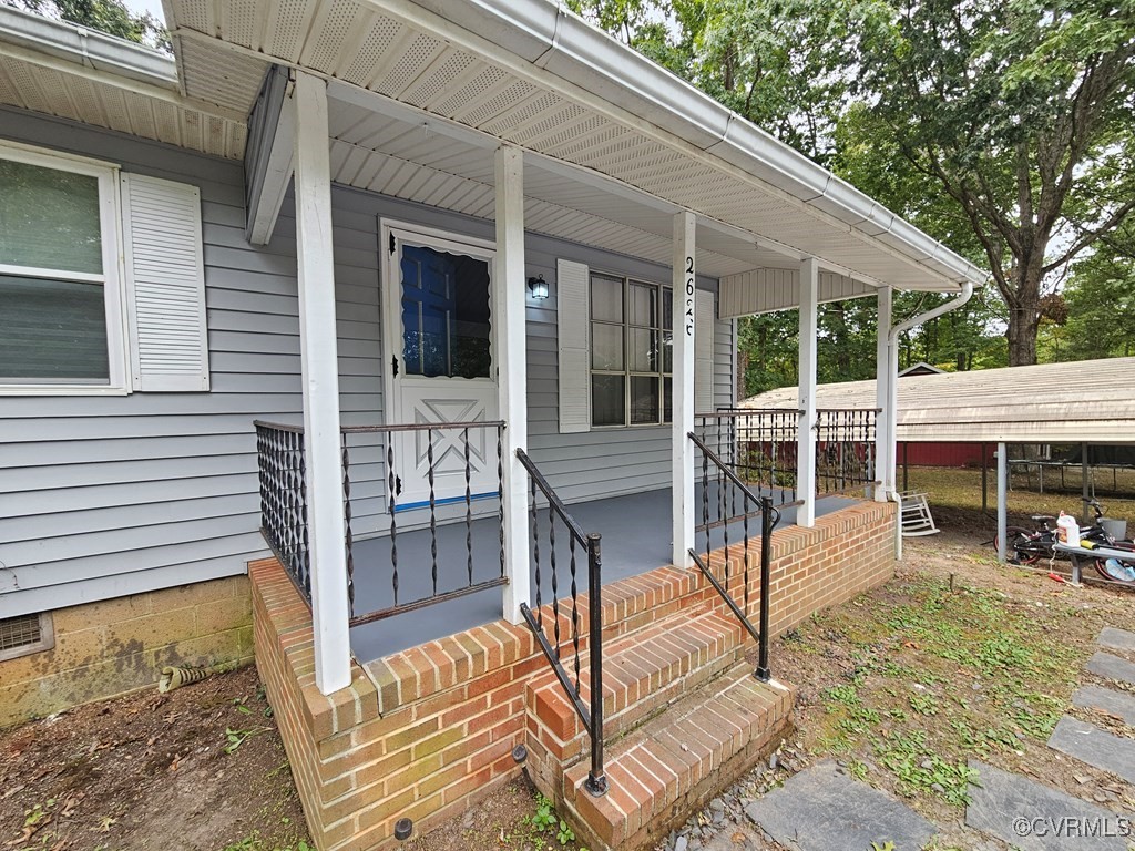 2626 Troublesome Creek Road Dillwyn, VA 23936 - Photo 4 of 24 a view of a house with backyard and porch