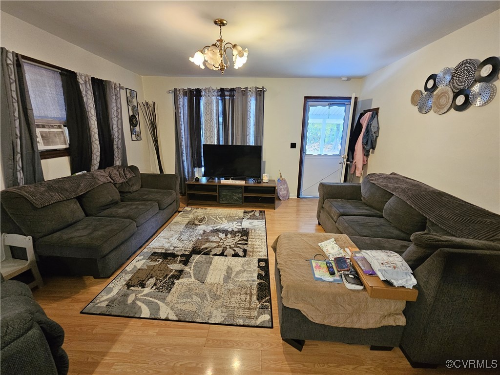 2626 Troublesome Creek Road Dillwyn, VA 23936 - Photo 5 of 24 a living room with furniture and a flat screen tv