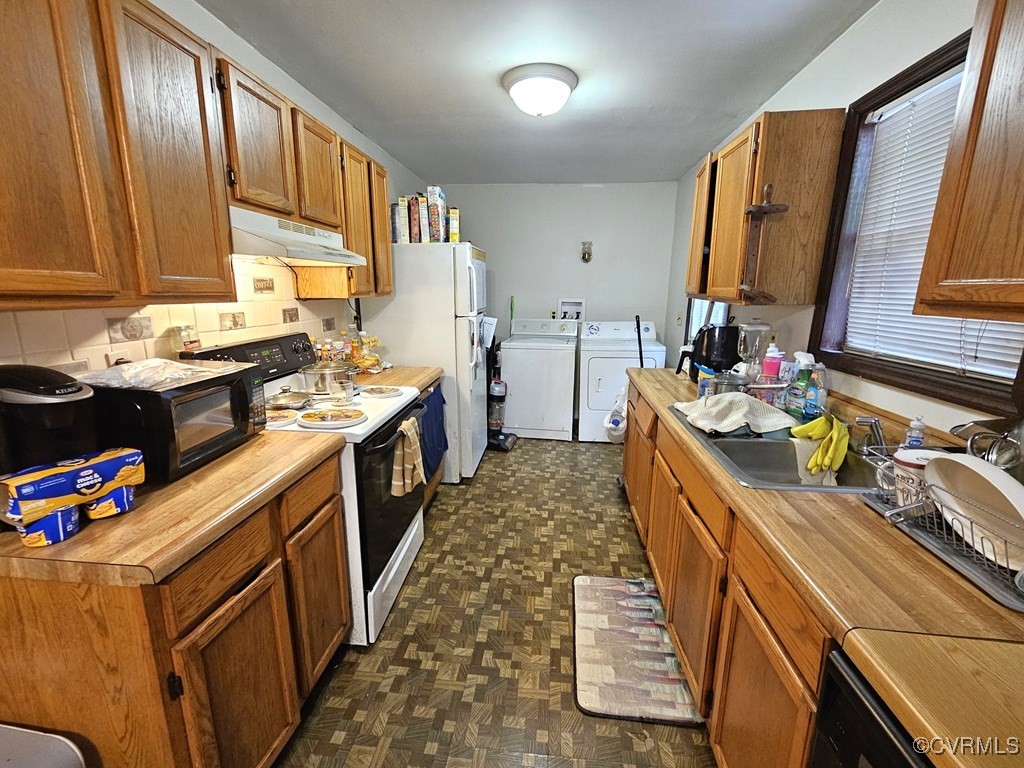 2626 Troublesome Creek Road Dillwyn, VA 23936 - Photo 6 of 24 a kitchen with a sink stove and cabinets