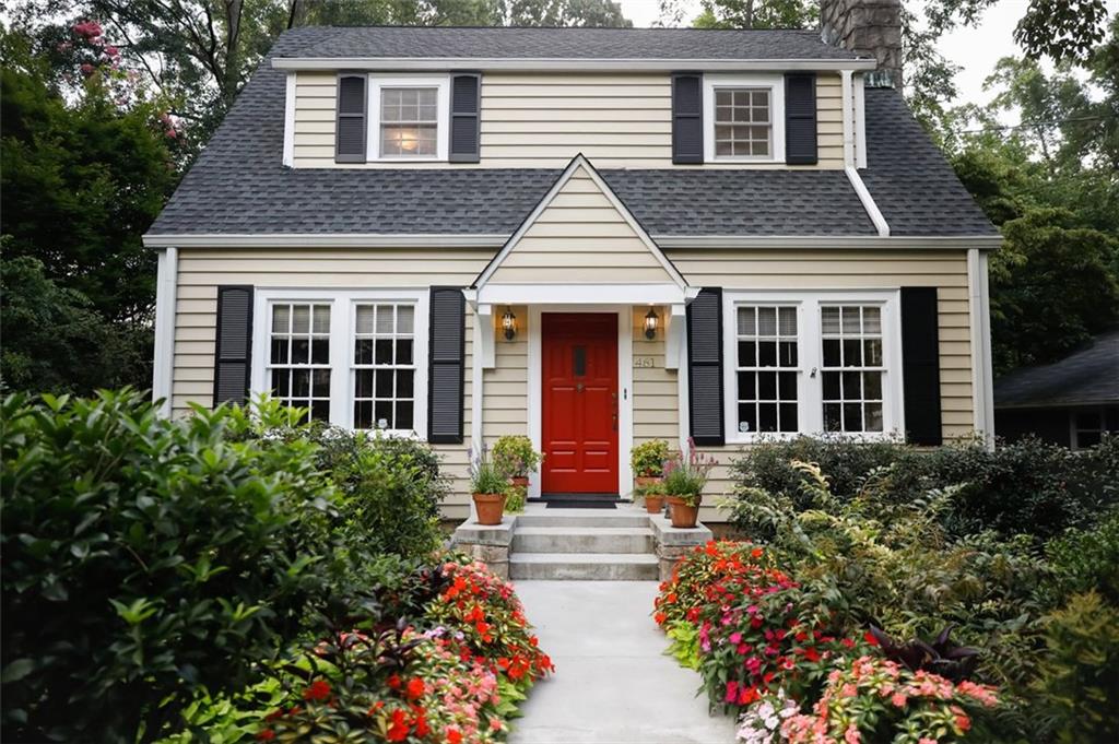 461 Nelson Ferry Road Decatur, GA 30030 - Photo 1 of 1 a front view of a house with garden