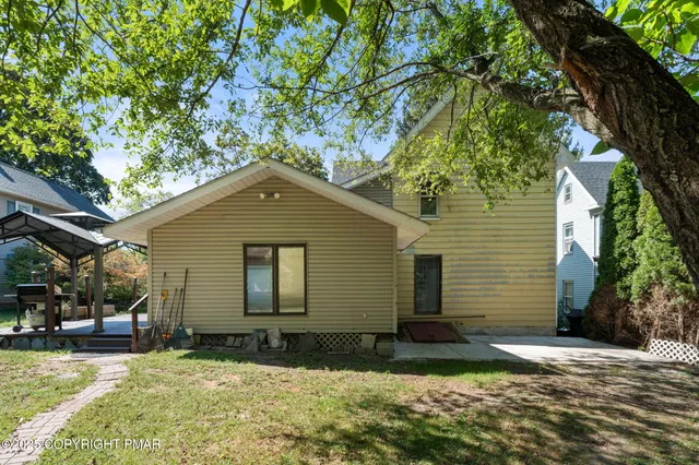 a view of a house with a patio