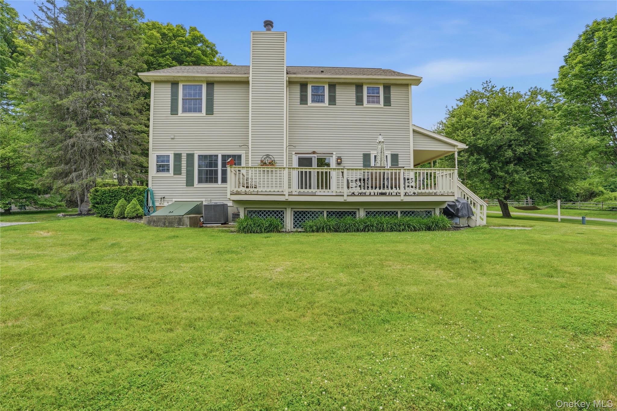 226 Cart Road, Unit C Dover Plains, NY 12522 - Photo 33 of 47 Back of house with wood deck