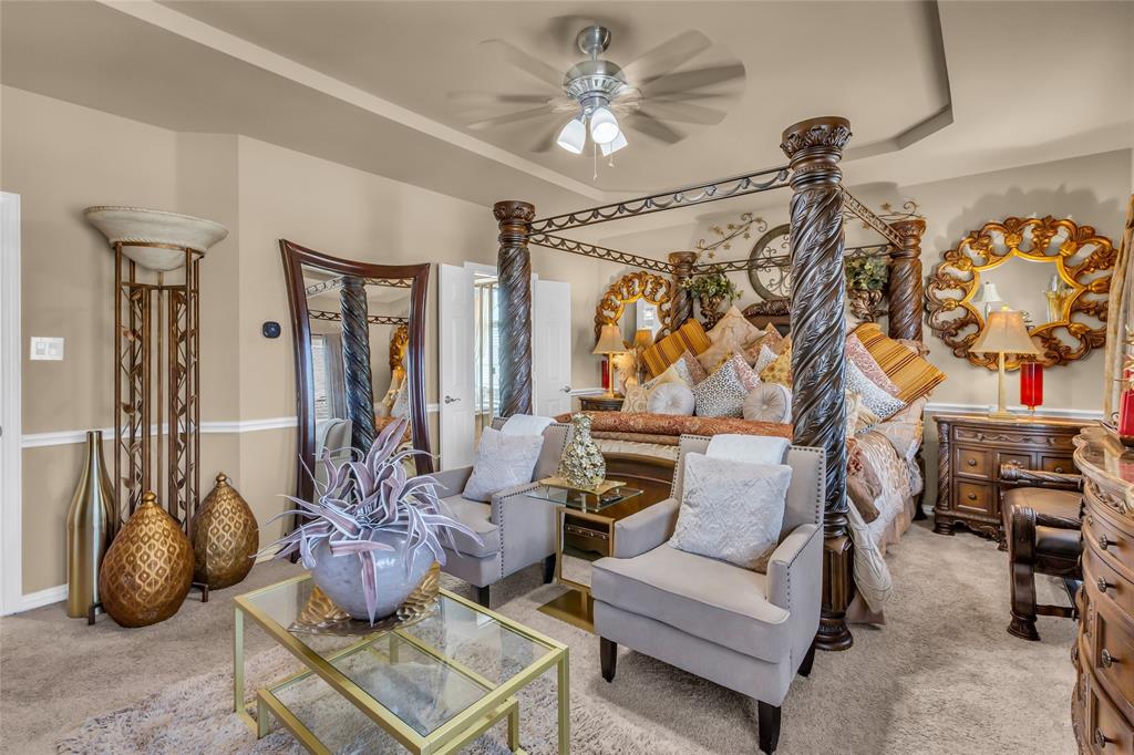 100 Spruce Street Red Oak, TX 75154 - Photo 16 of 32 a living room with furniture and a chandelier