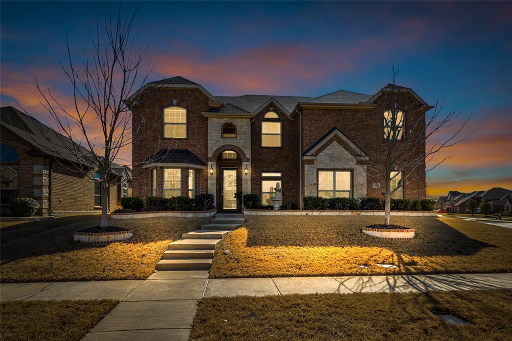 100 Spruce Street Red Oak, TX 75154 - Photo 32 of 32 a view of a brick house with a yard