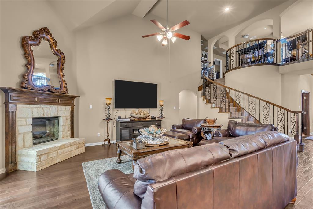 100 Spruce Street Red Oak, TX 75154 - Photo 7 of 32 a living room with furniture and a fireplace