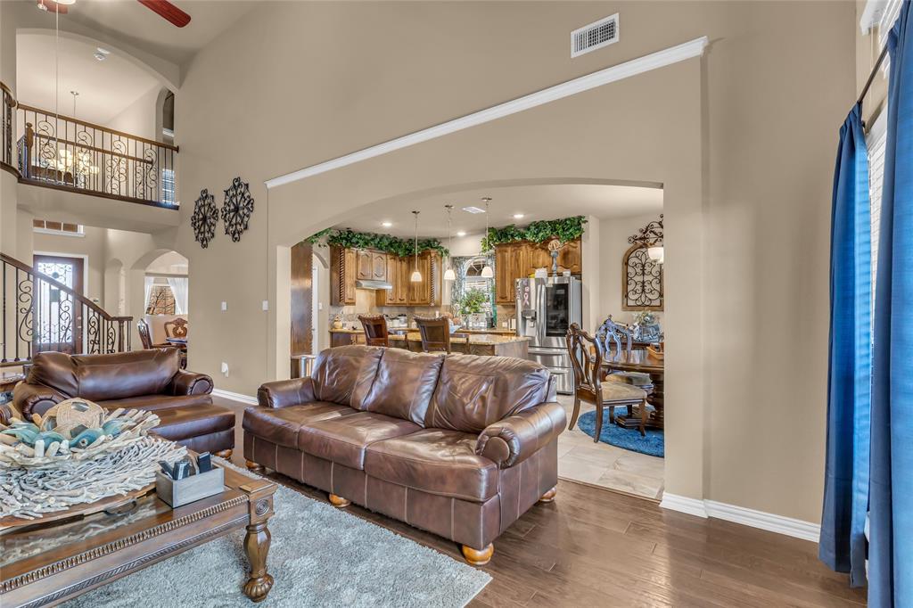 100 Spruce Street Red Oak, TX 75154 - Photo 8 of 32 a living room with furniture and wooden floor
