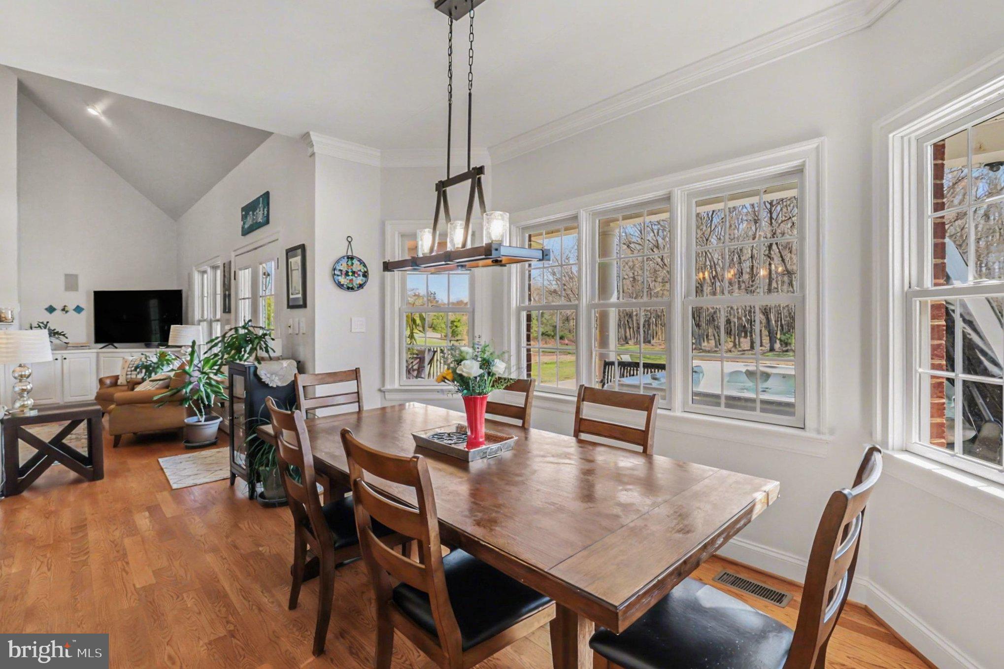 16225 Parrish Farm Road Montpelier, VA 23192 - Photo 12 of 38 a view of a dining room with furniture window and wooden floor