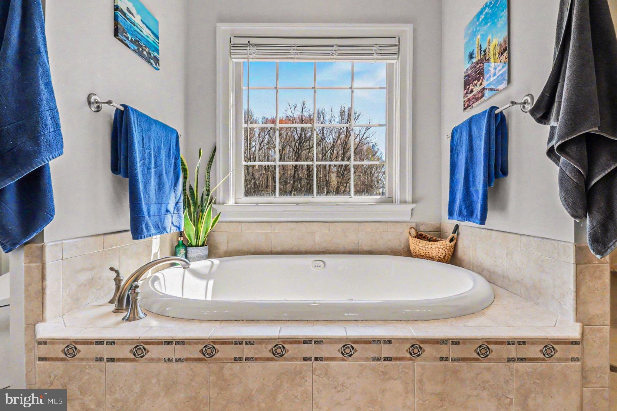 16225 Parrish Farm Road Montpelier, VA 23192 - Photo 17 of 38 a bathroom with a granite countertop sink and a mirror