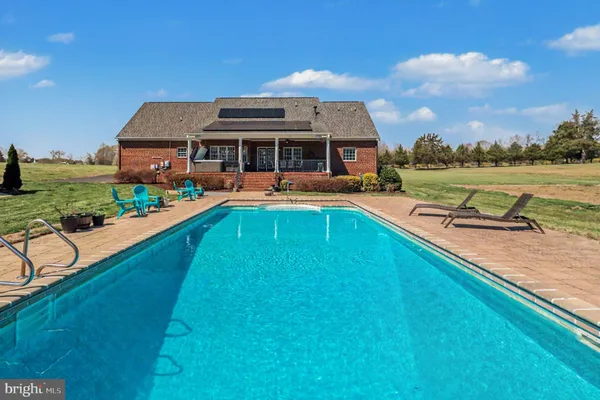 a view of a house with pool
