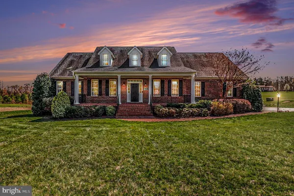 front view of a house with a garden