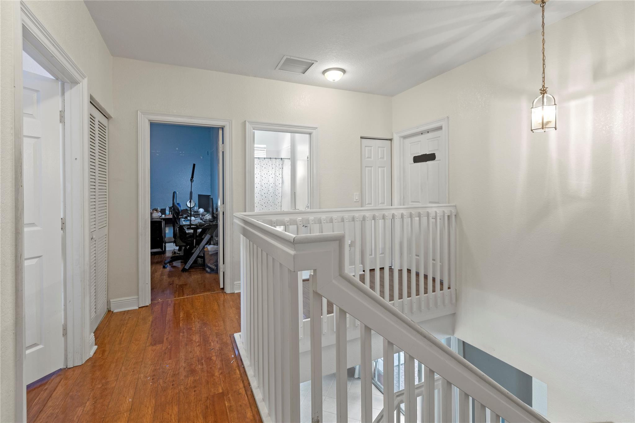 Undisclosed Address Miramar, FL 33029 - Photo 15 of 30 a view of a hallway with a livingroom and furniture
