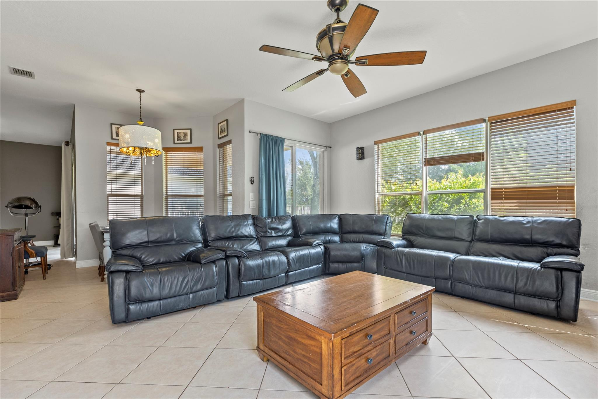 Undisclosed Address Miramar, FL 33029 - Photo 23 of 30 a living room with furniture and a large window