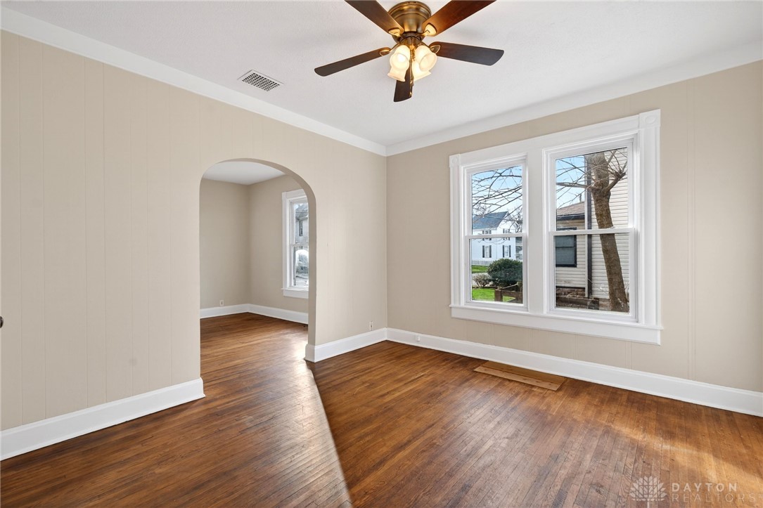 585 North Spring Street Wilmington, OH 45177 - Photo 10 of 21 This inviting space features hardwood floors and ample natural light, perfect for everyday living.