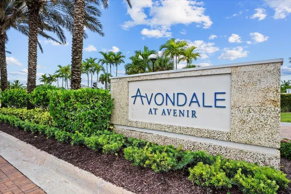 a sign that is next to a road