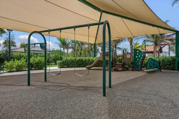 a view of a park with a slide