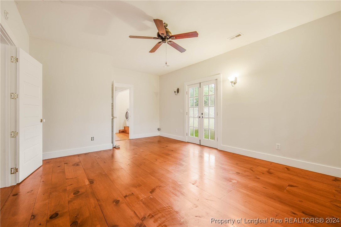 222 Goodwill Road Southern Pines, NC 28387 - Photo 24 of 49 wooden floor in an empty room