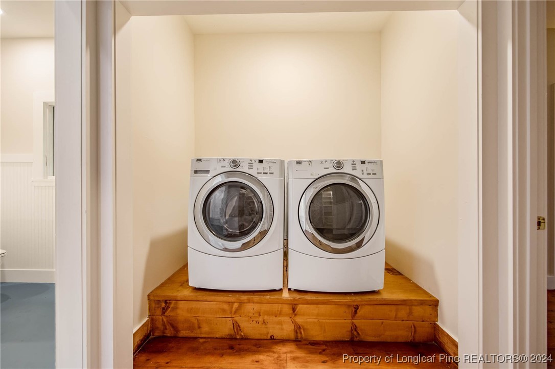 222 Goodwill Road Southern Pines, NC 28387 - Photo 27 of 49 a utility room with dryer and washer