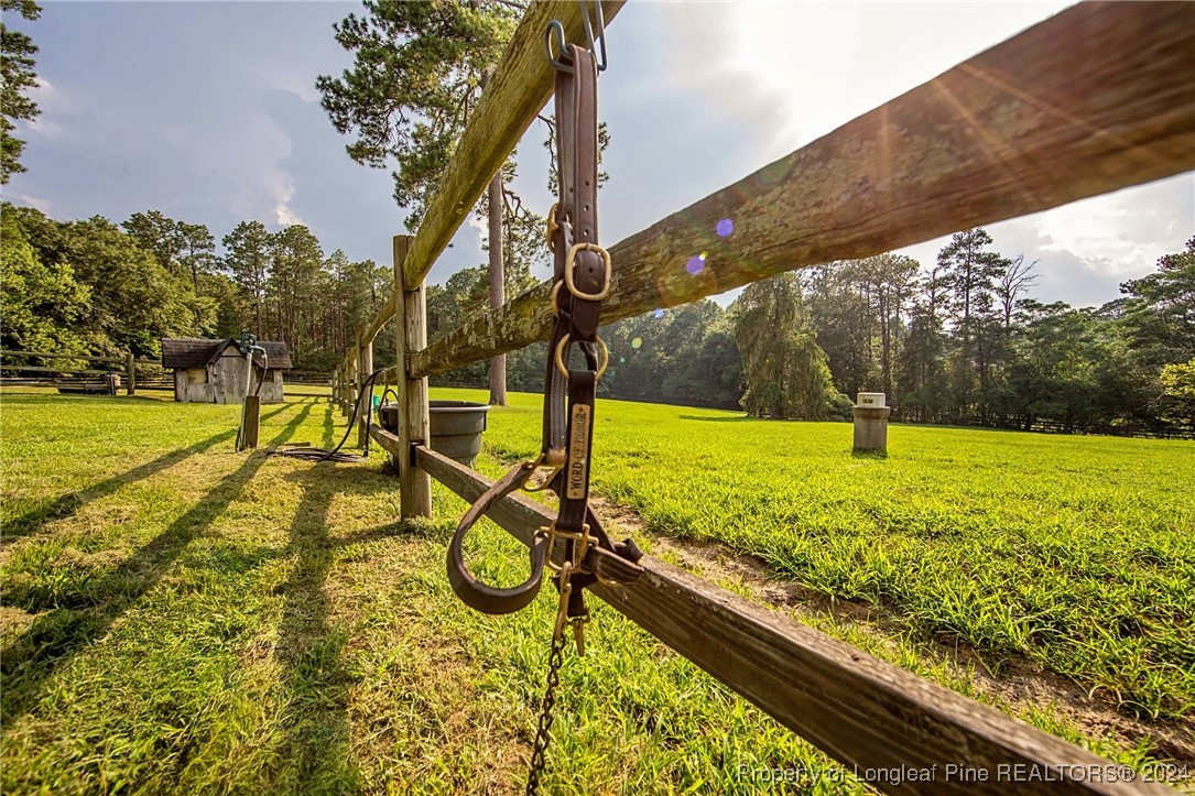 222 Goodwill Road Southern Pines, NC 28387 - Photo 42 of 49 a view of a swimming pool with a patio
