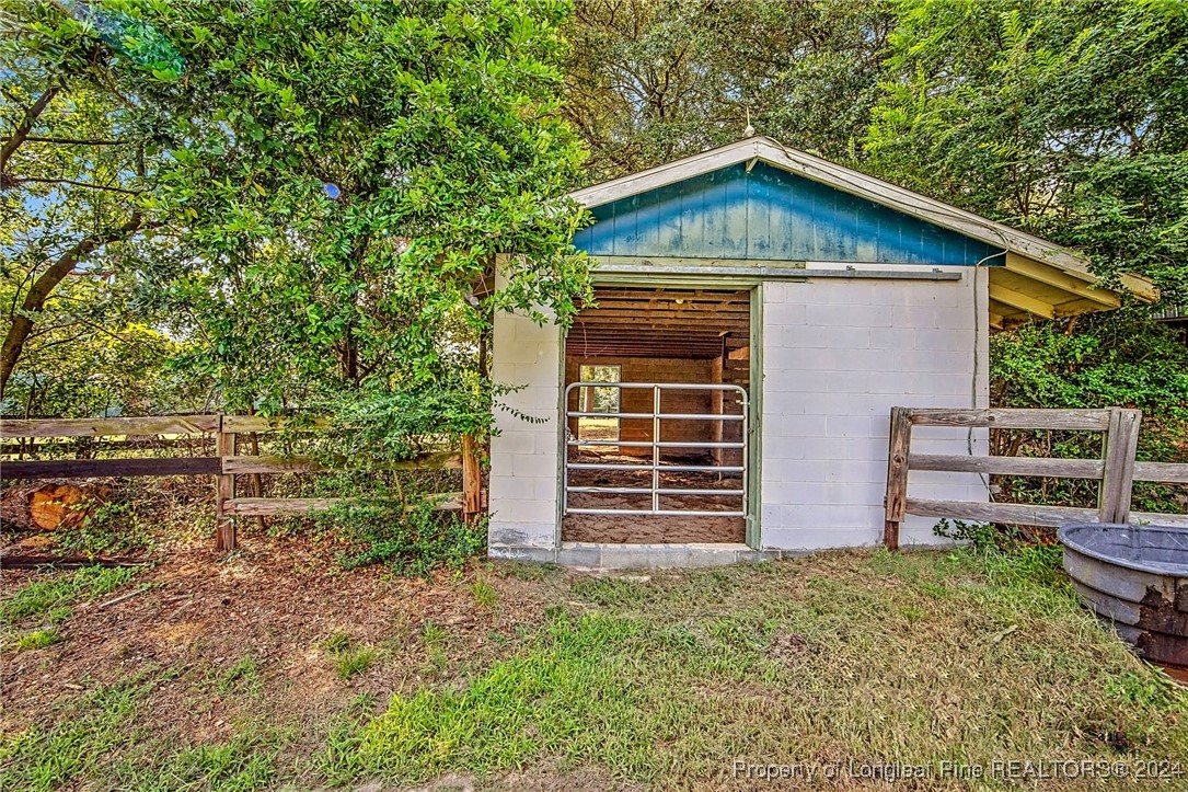 222 Goodwill Road Southern Pines, NC 28387 - Photo 45 of 49 a front view of house with yard