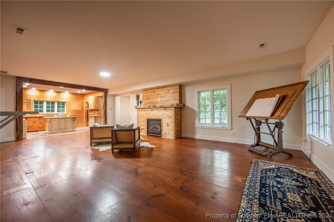 222 Goodwill Road Southern Pines, NC 28387 - Photo 10 of 49 a living room with furniture and a table