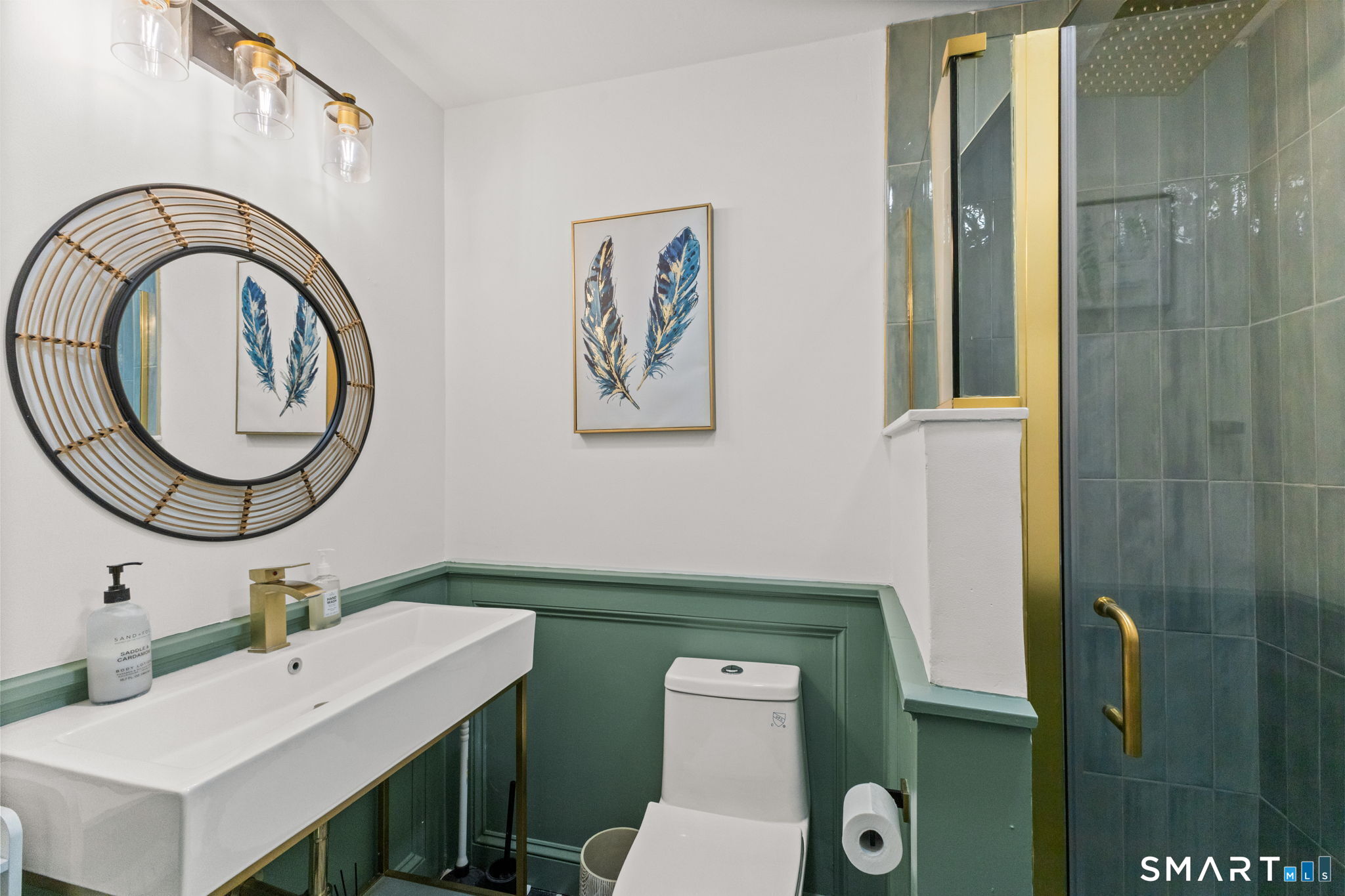 299 Redding Road Redding, CT 06896 - Photo 12 of 40 a bathroom with a toilet sink and mirror