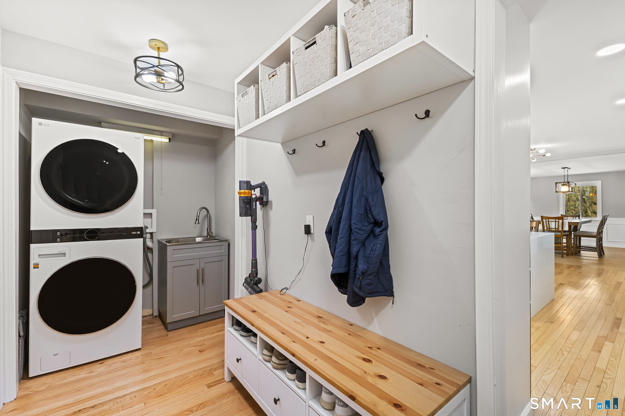 299 Redding Road Redding, CT 06896 - Photo 15 of 40 a view of a bedroom with washer and dryer