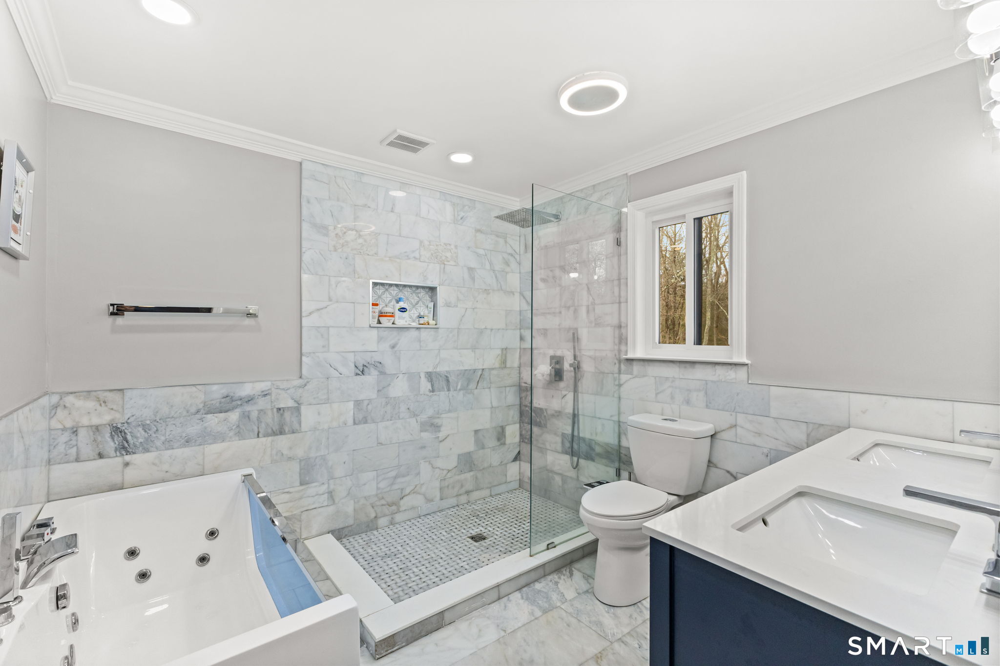 299 Redding Road Redding, CT 06896 - Photo 18 of 40 a bathroom with a sink a toilet and shower