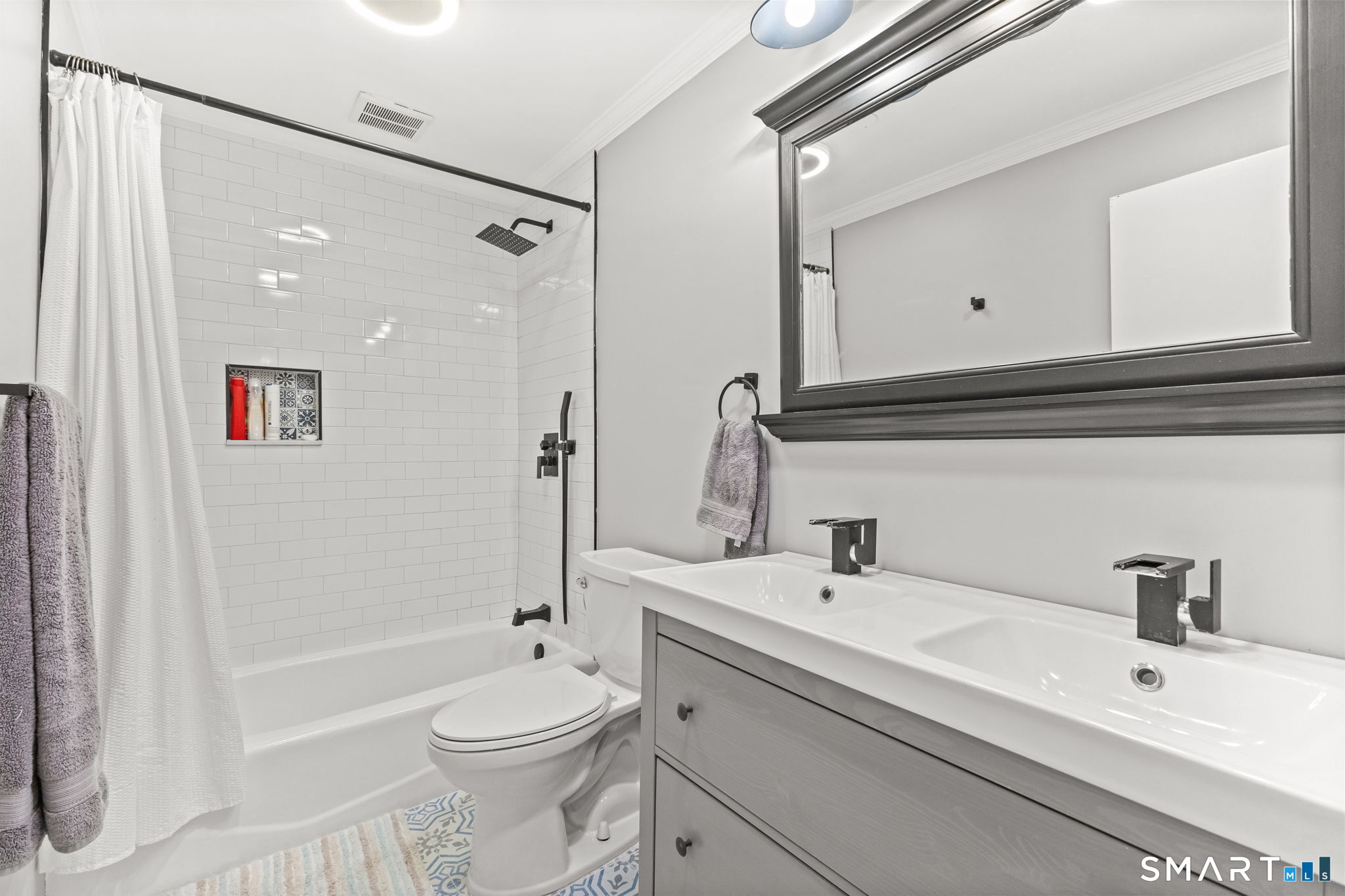 299 Redding Road Redding, CT 06896 - Photo 20 of 40 a bathroom with a sink a toilet and shower