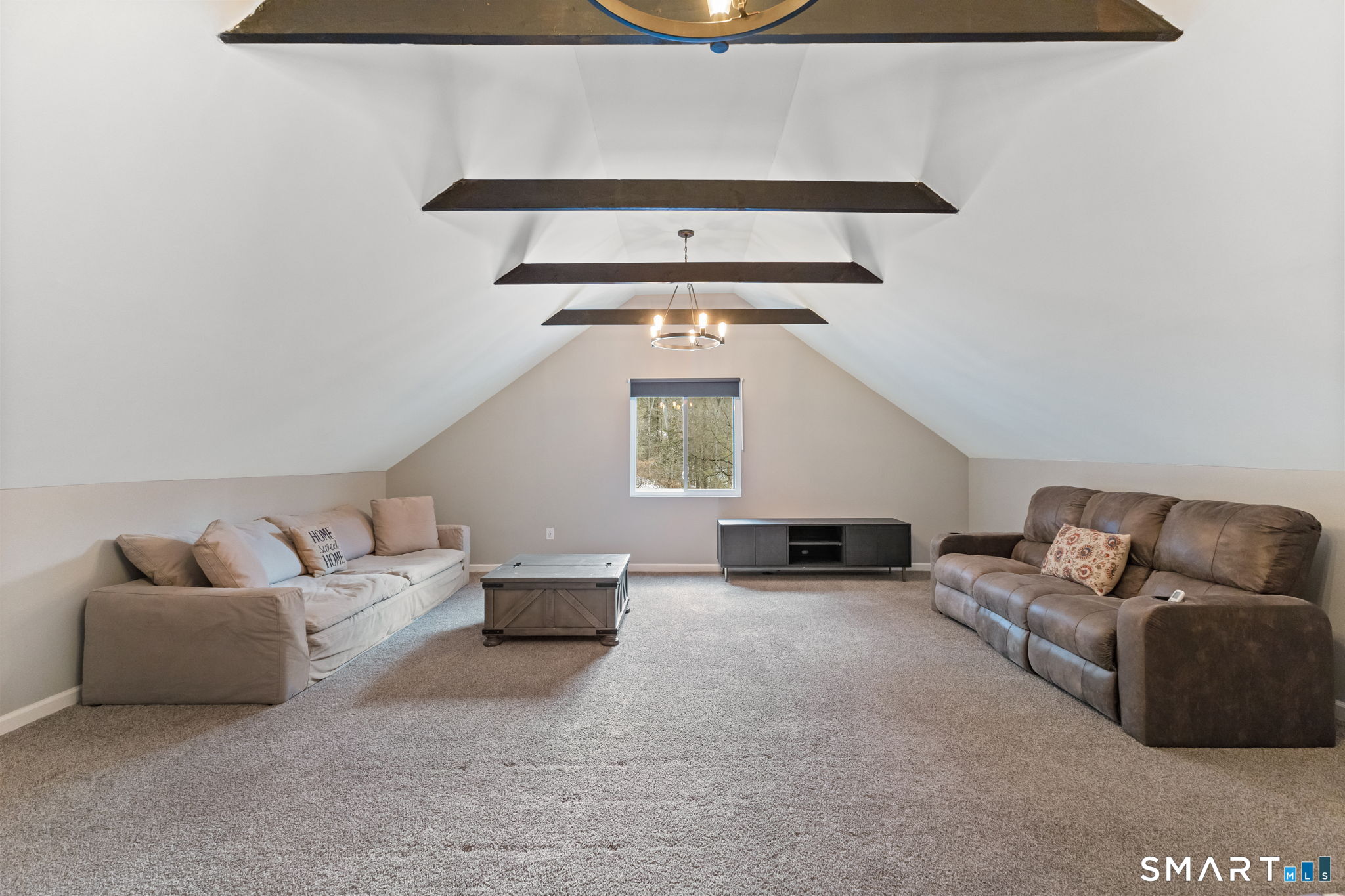 299 Redding Road Redding, CT 06896 - Photo 24 of 40 a living room with furniture and a window