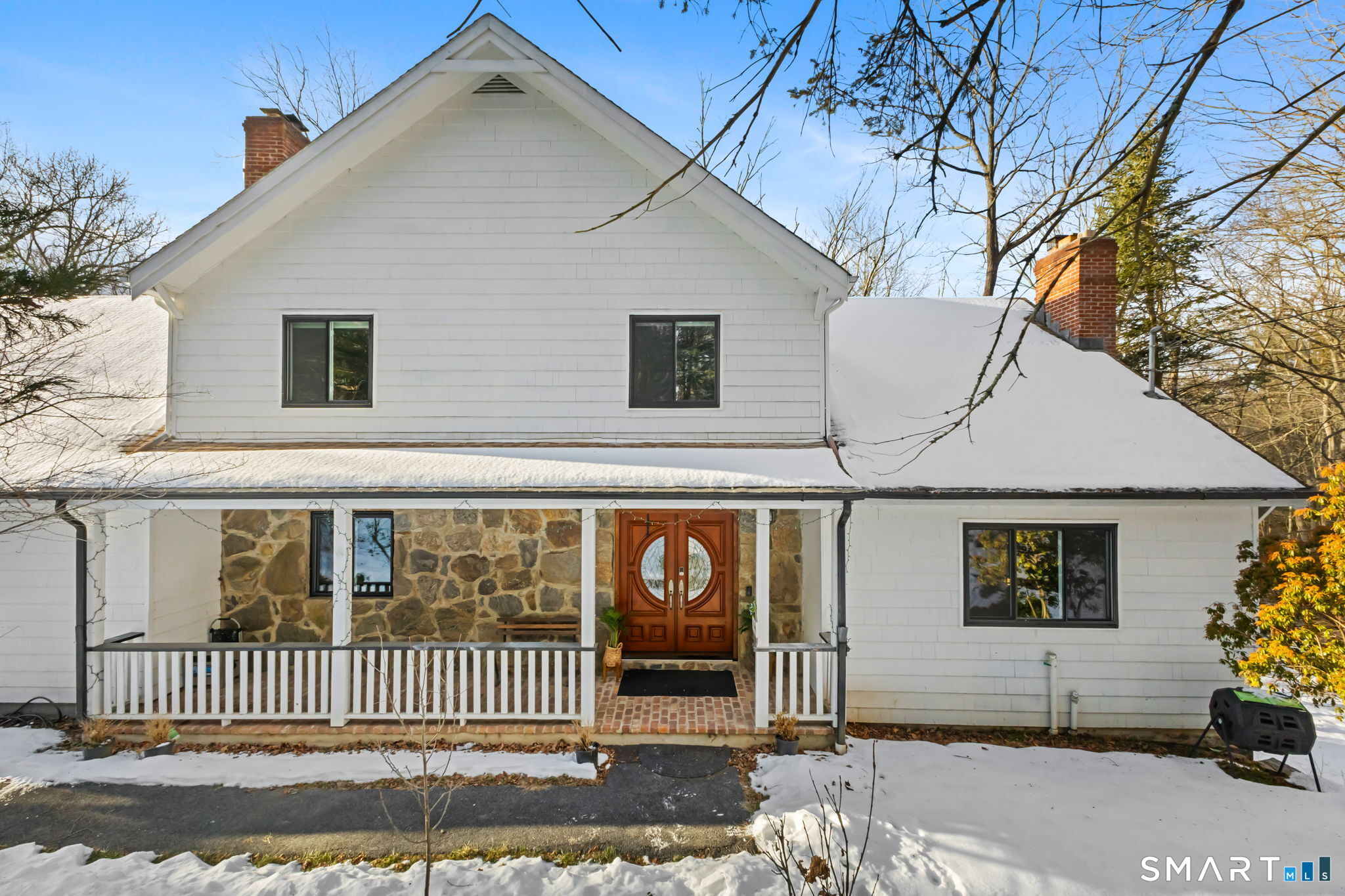 299 Redding Road Redding, CT 06896 - Photo 32 of 40 a view of a house with a garden