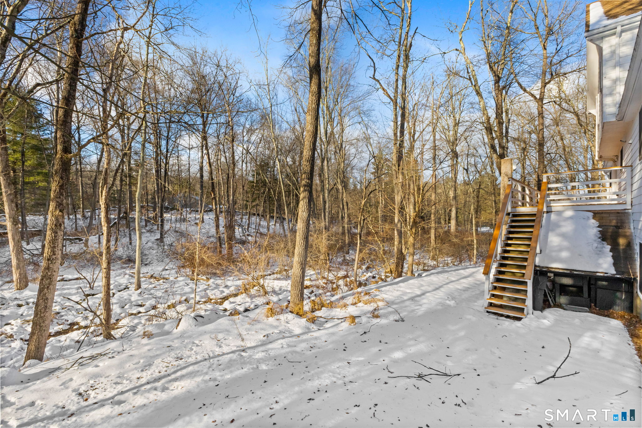 299 Redding Road Redding, CT 06896 - Photo 36 of 40 a view of a covered with snow in the background