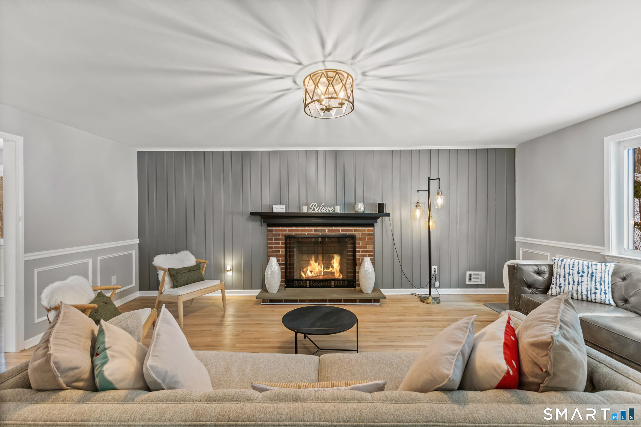 299 Redding Road Redding, CT 06896 - Photo 4 of 40 a living room with furniture and a fireplace