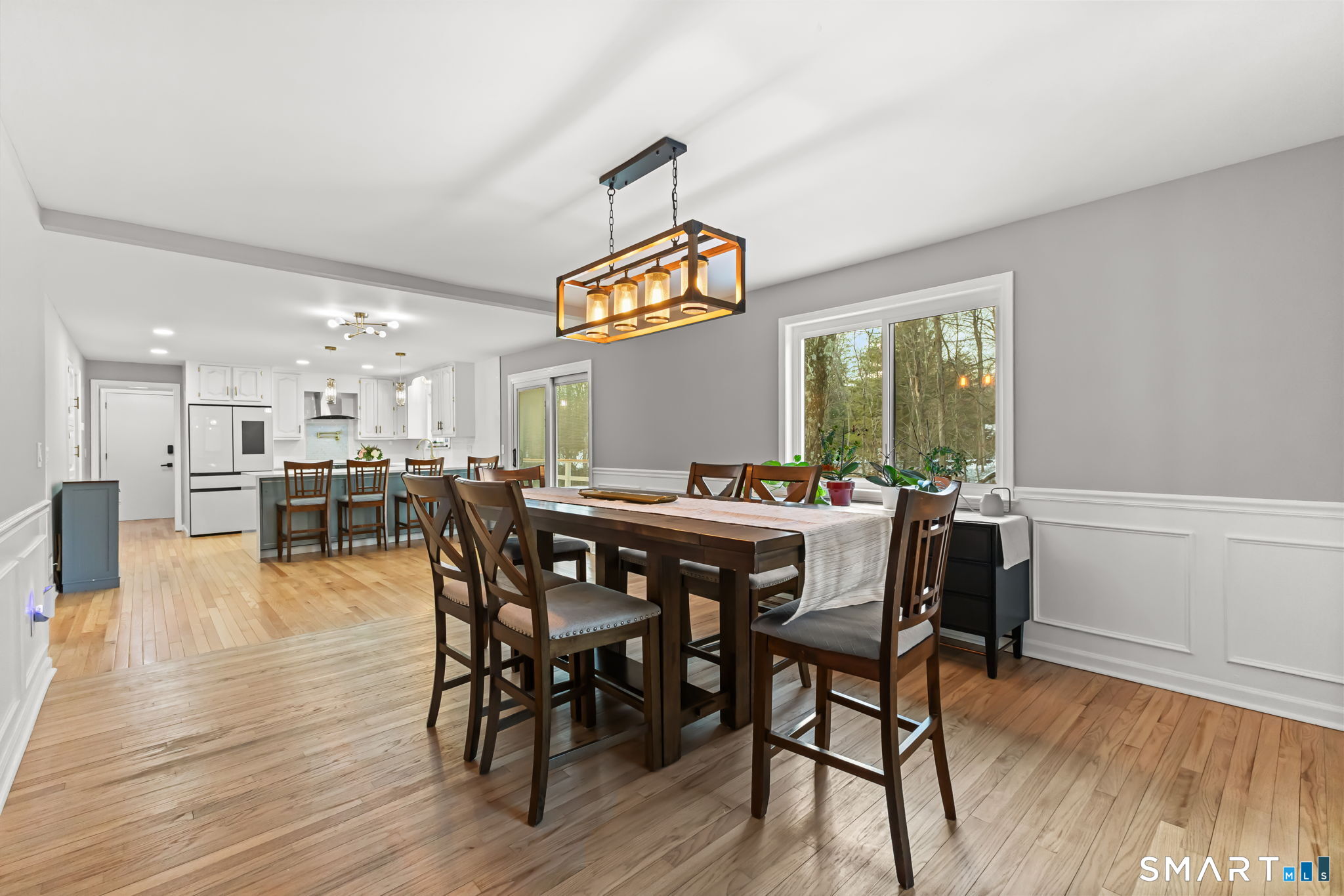 299 Redding Road Redding, CT 06896 - Photo 6 of 40 a dining room with furniture window wooden floor