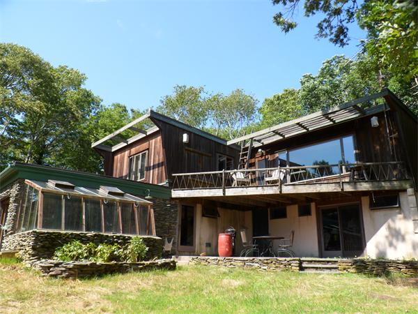 392 Point Road Marion, MA 02738 - Photo 17 of 21 a view of a house with roof deck and sitting area